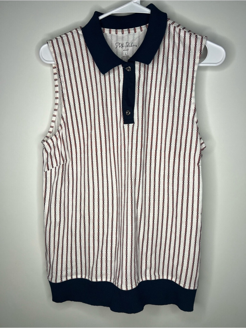 sleeveless patterned polo top with navy trim size large